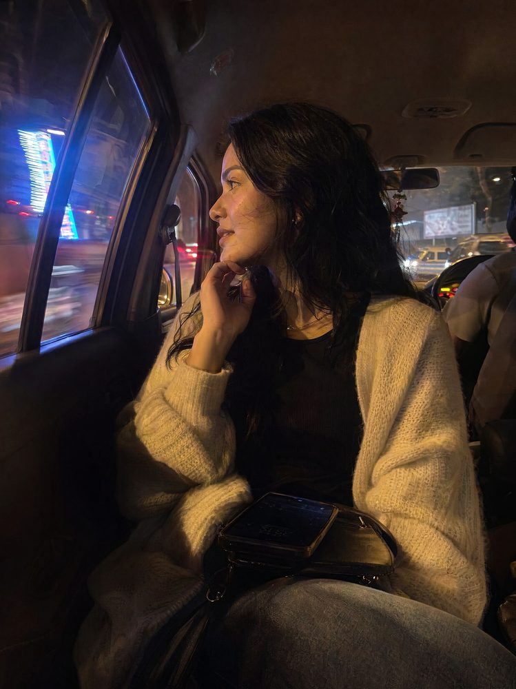 City lights from the backseat