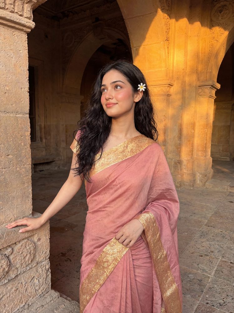 Pink saree, old stones